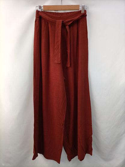 OTRAS.Pantalones fluidos teja Tu. (s)