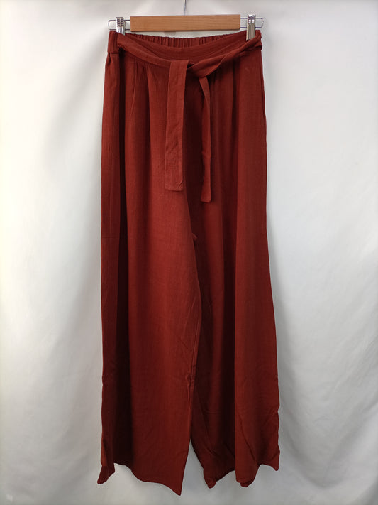 OTRAS.Pantalones fluidos teja Tu. (s)