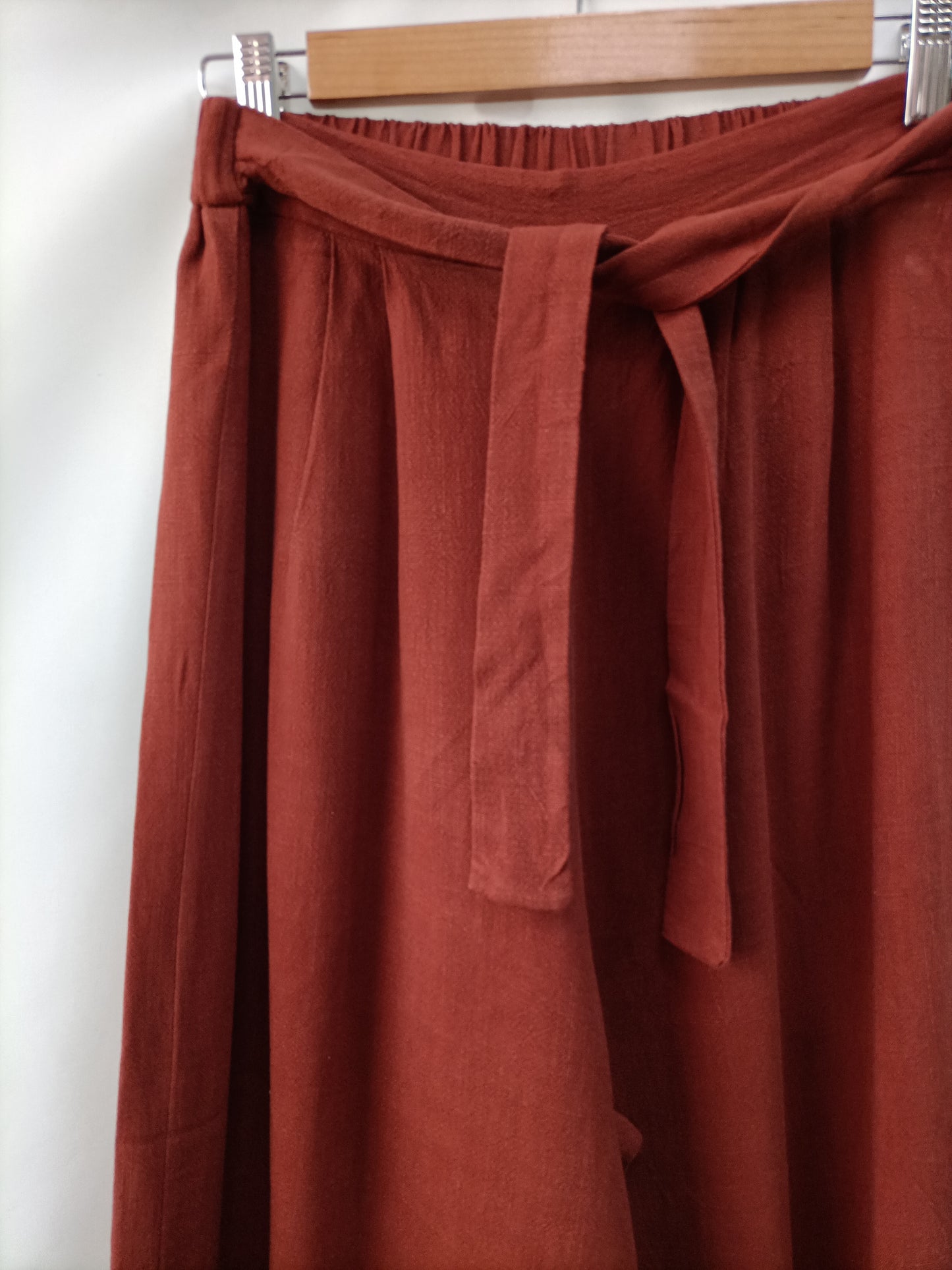 OTRAS.Pantalones fluidos teja Tu. (s)