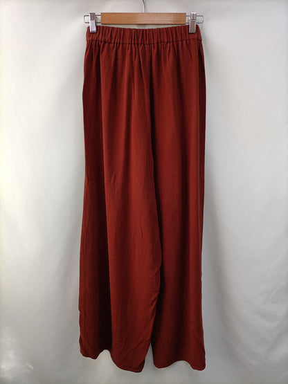 OTRAS.Pantalones fluidos teja Tu. (s)