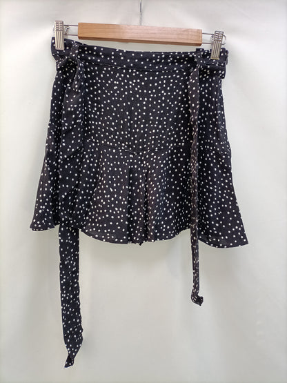 ZARA. Falda/pantalón lunares T.s