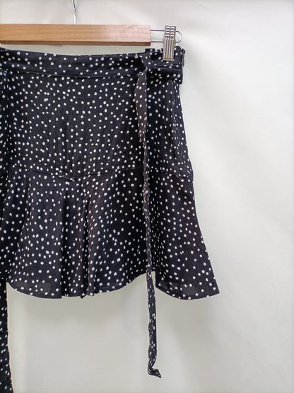 ZARA. Falda/pantalón lunares T.s
