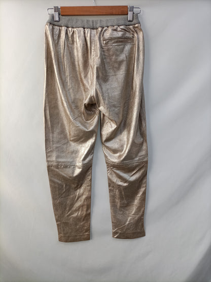 TCN. Ts Gold Leather Pants