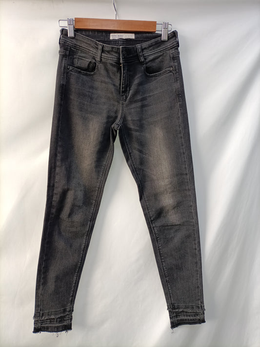 ZARA. Black distressed trousers, size 34