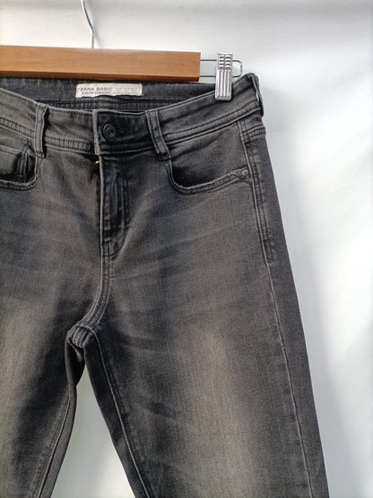 ZARA. Black distressed trousers, size 34