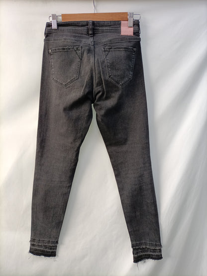 ZARA. Black distressed trousers, size 34