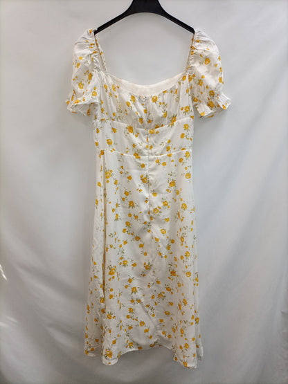CHAMOMILE. Vestido midi flores Tu(s)