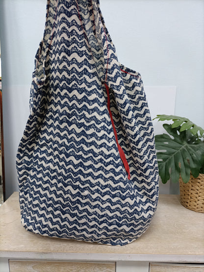 OTRAS. Bolso de tela rayas