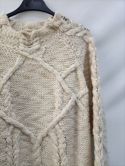 IRO. Jersey beige ochos