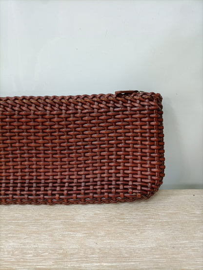 AÏTA.Cartera de mano trenzada