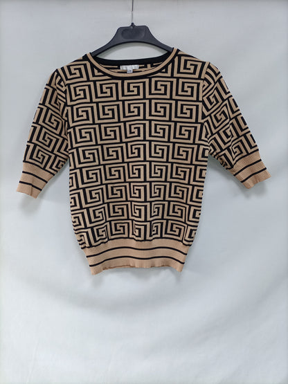 OTRAS.Top beige y negro T.l/xl