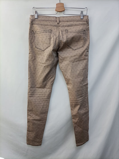 WHITE. Brown pants with black polka dots, size 38