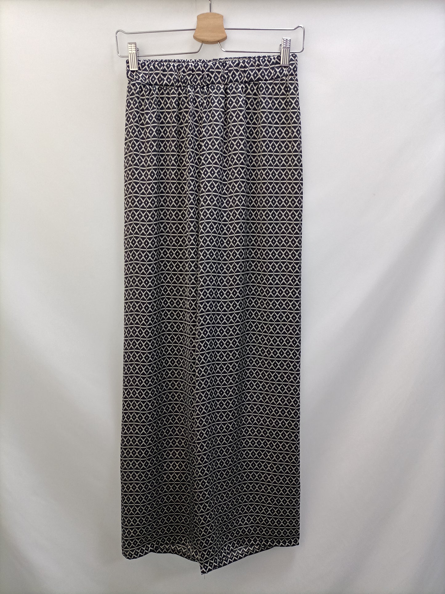 BRANDY MELVILLE. Pantalón fluido estampado T.s