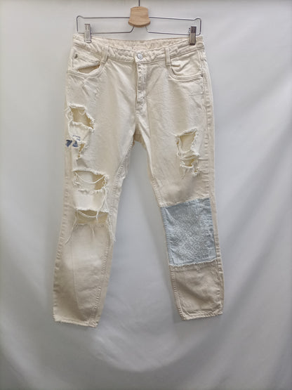ZARA. Ripped beige trousers, size 34
