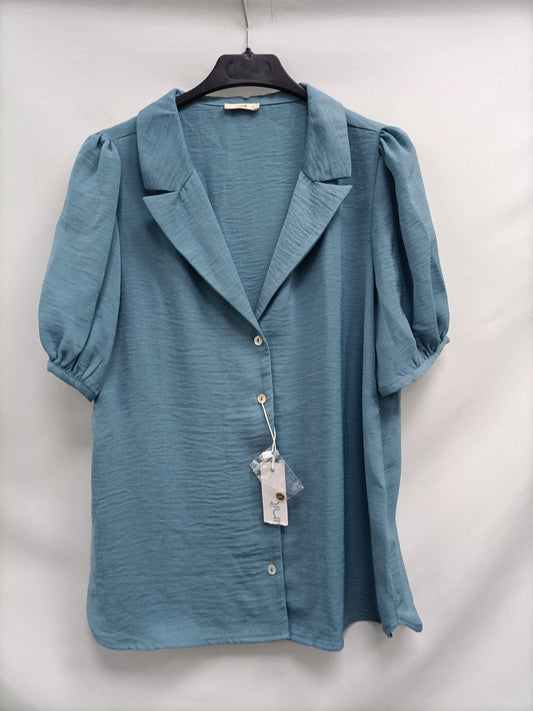 UNIT. Blusa azul Fluido T.s