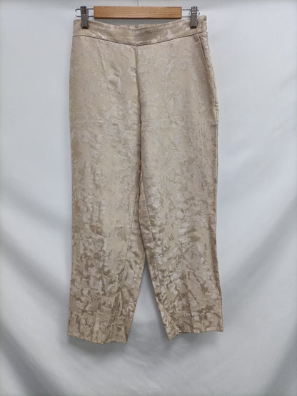 SCALPERS. Pantalón beige fluido T.m