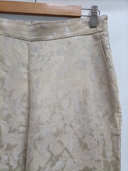 SCALPERS. Pantalón beige fluido T.m