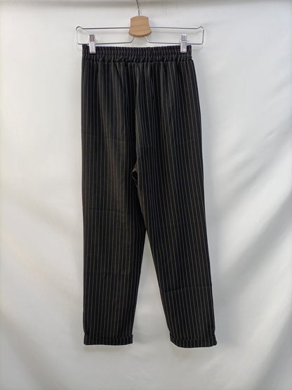 OTHERS. Black Ts striped pants