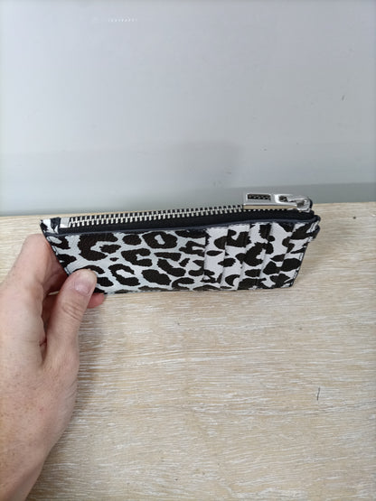 BIMBA Y LOLA. Monedero animal print