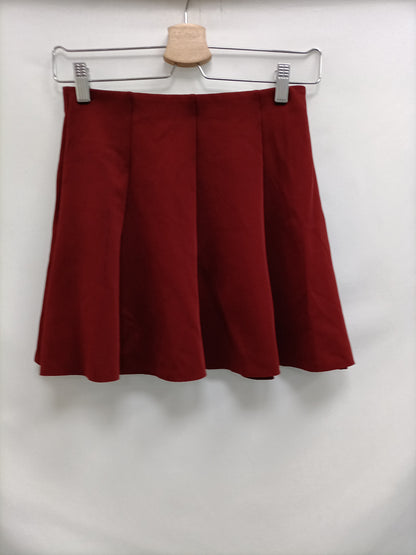 OTRAS. Falda burdeos tablas Tu(s)