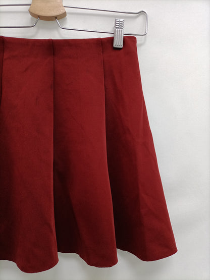 OTRAS. Falda burdeos tablas Tu(s)