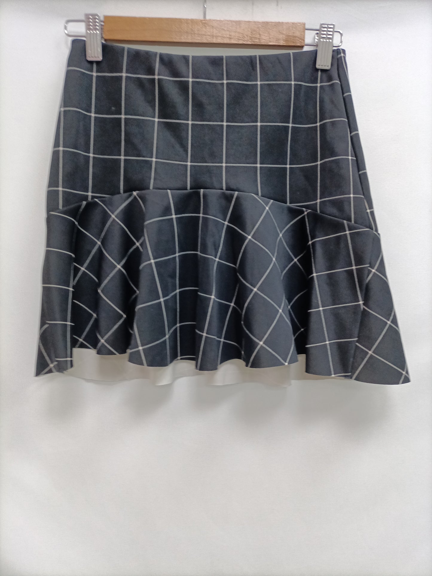 OTRAS. Falda negra cuadros Tu(s)