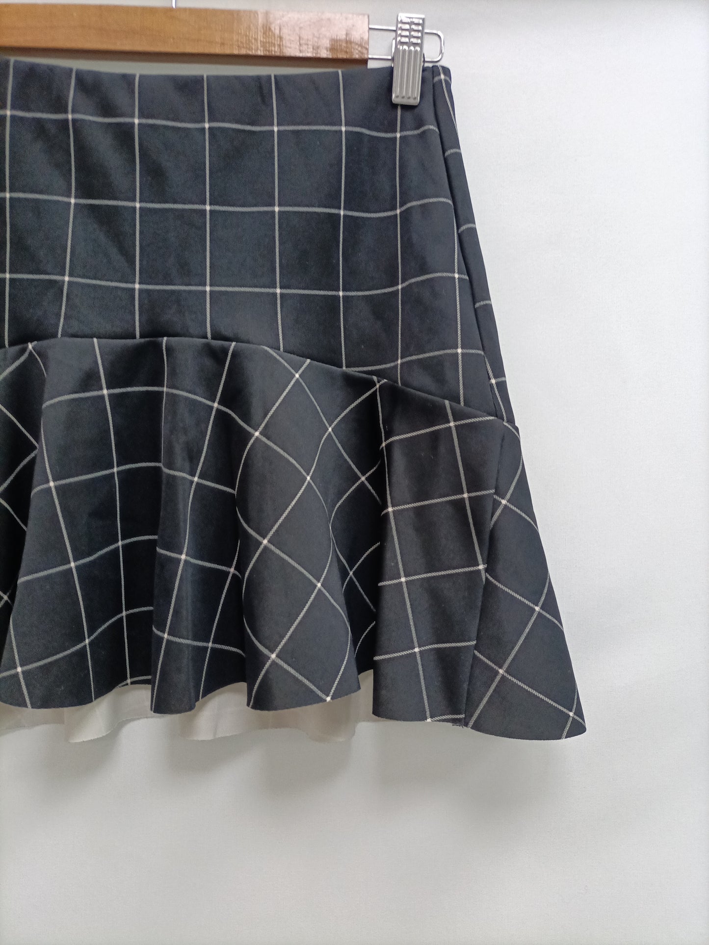 OTRAS. Falda negra cuadros Tu(s)