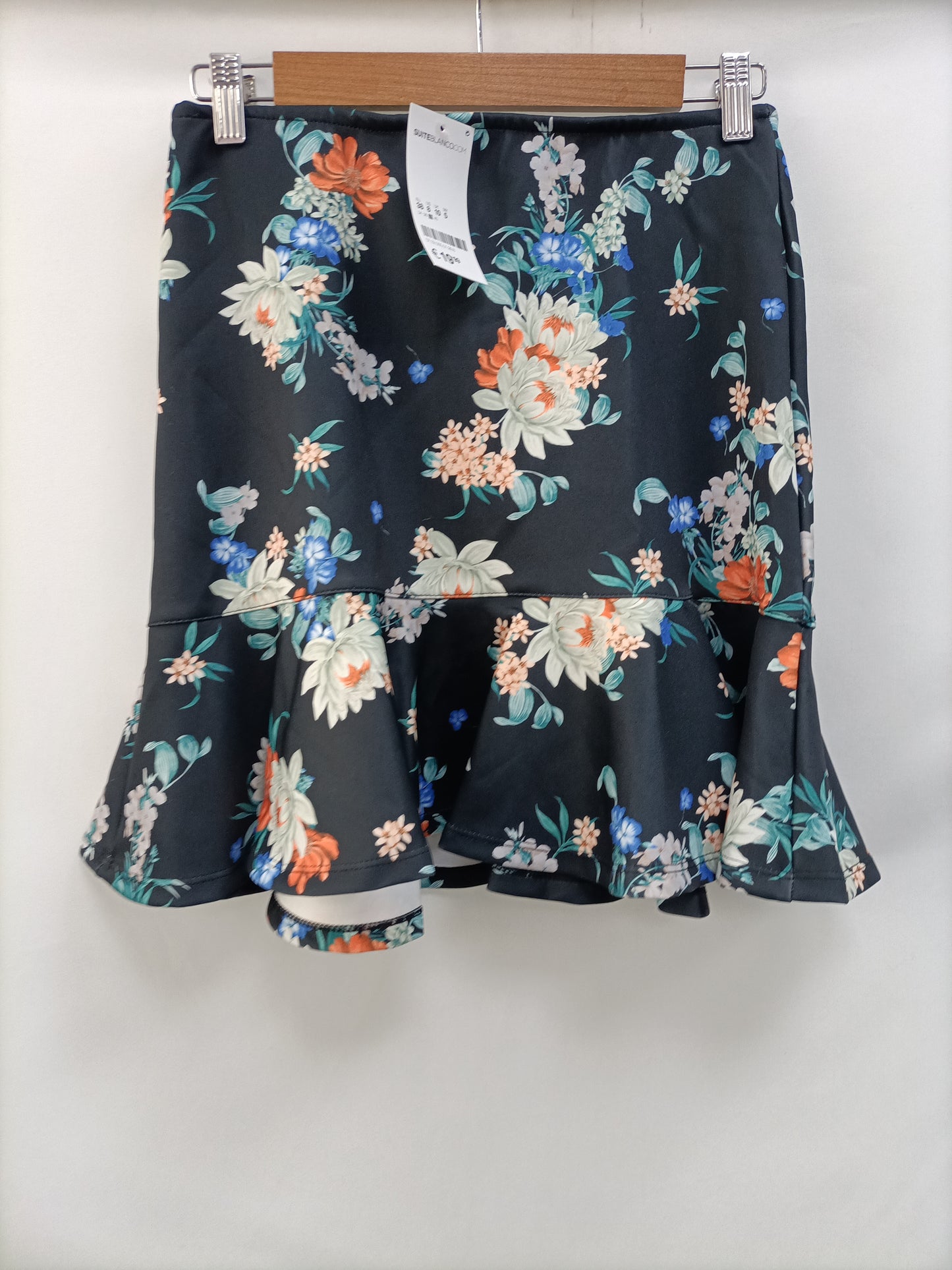 WHITE. Black floral skirt size 38