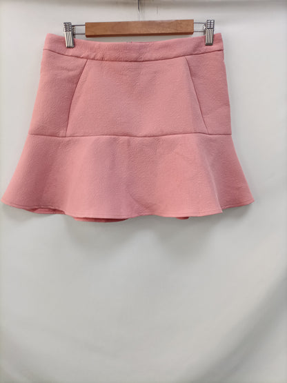 OTRAS. Falda rosa flores T.38