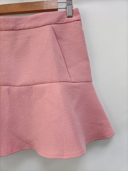 OTRAS. Falda rosa flores T.38