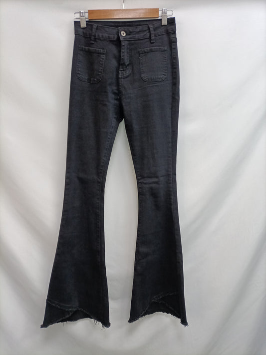OTRAS. Pantalón negro campana T.m