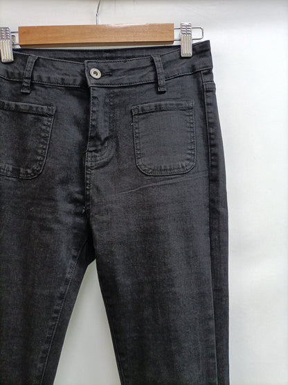 OTHERS. Black flared trousers Tm