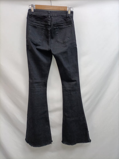 OTHERS. Black flared trousers Tm