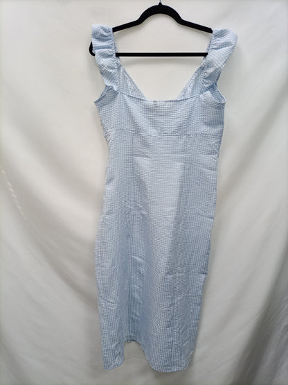 H&M. Vestido textura cuadros T.44