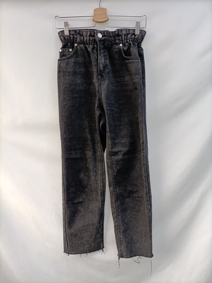 BERSHKA.Pantalones straight cintura fruncida T.34