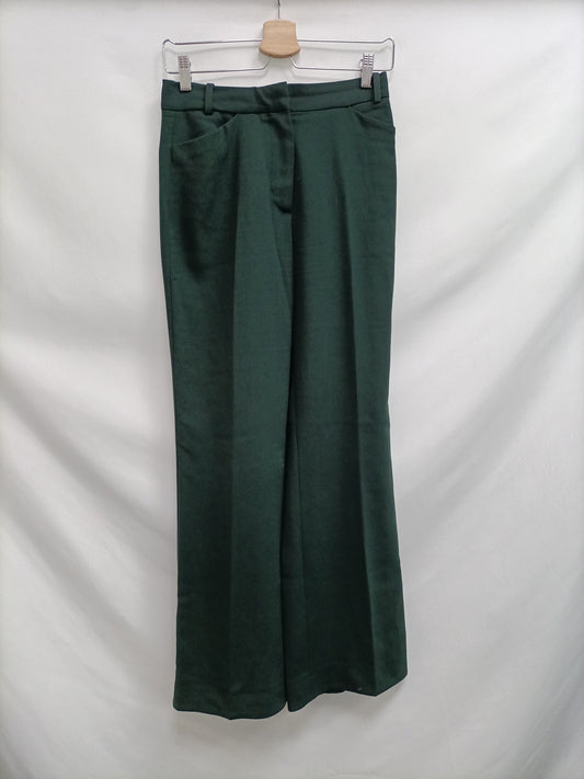 OTRAS.Pantalones palazzo verdes T.XS
