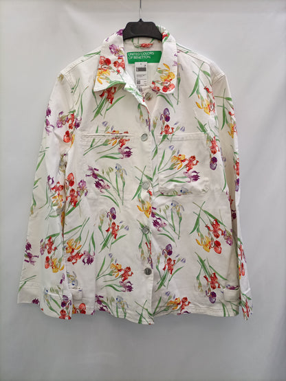 BENETTON. Cazadora denim flores T.s