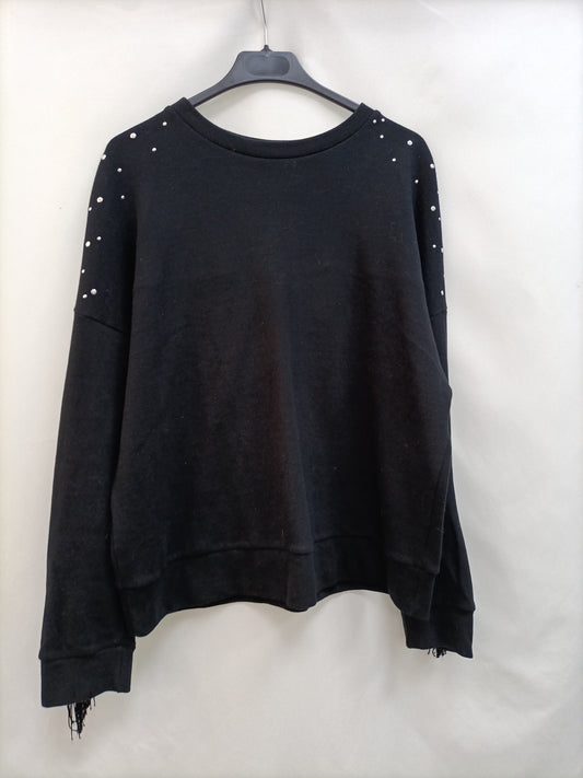 MANGO. Black sweatshirt with Ts fringes