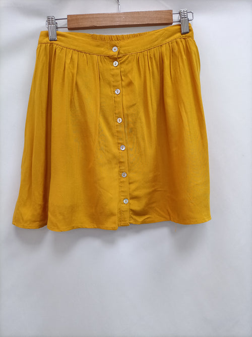 FOREVER21. Falda amarilla botones T.s