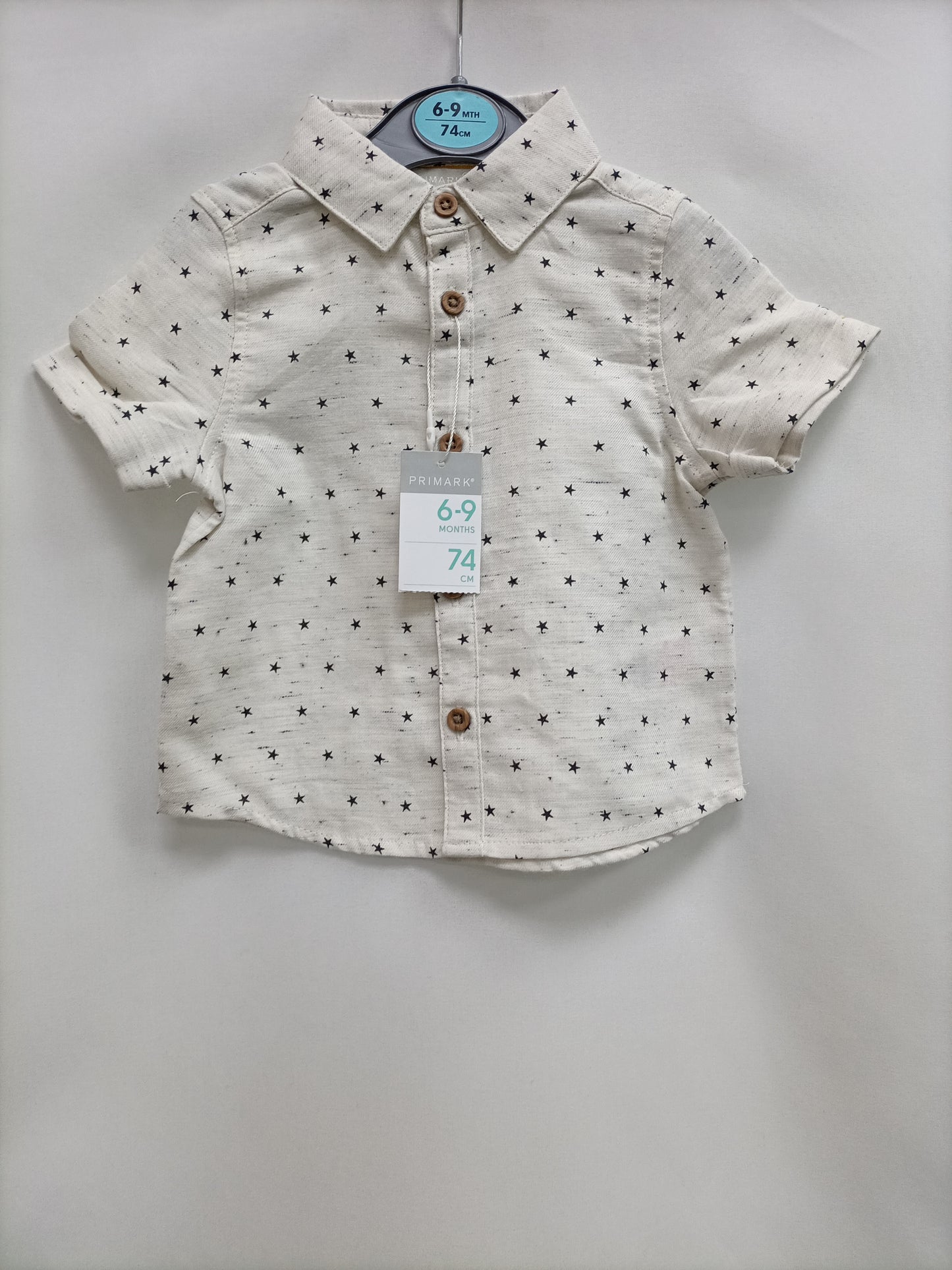 PRIMARK. Star shirt, size 6-9 months
