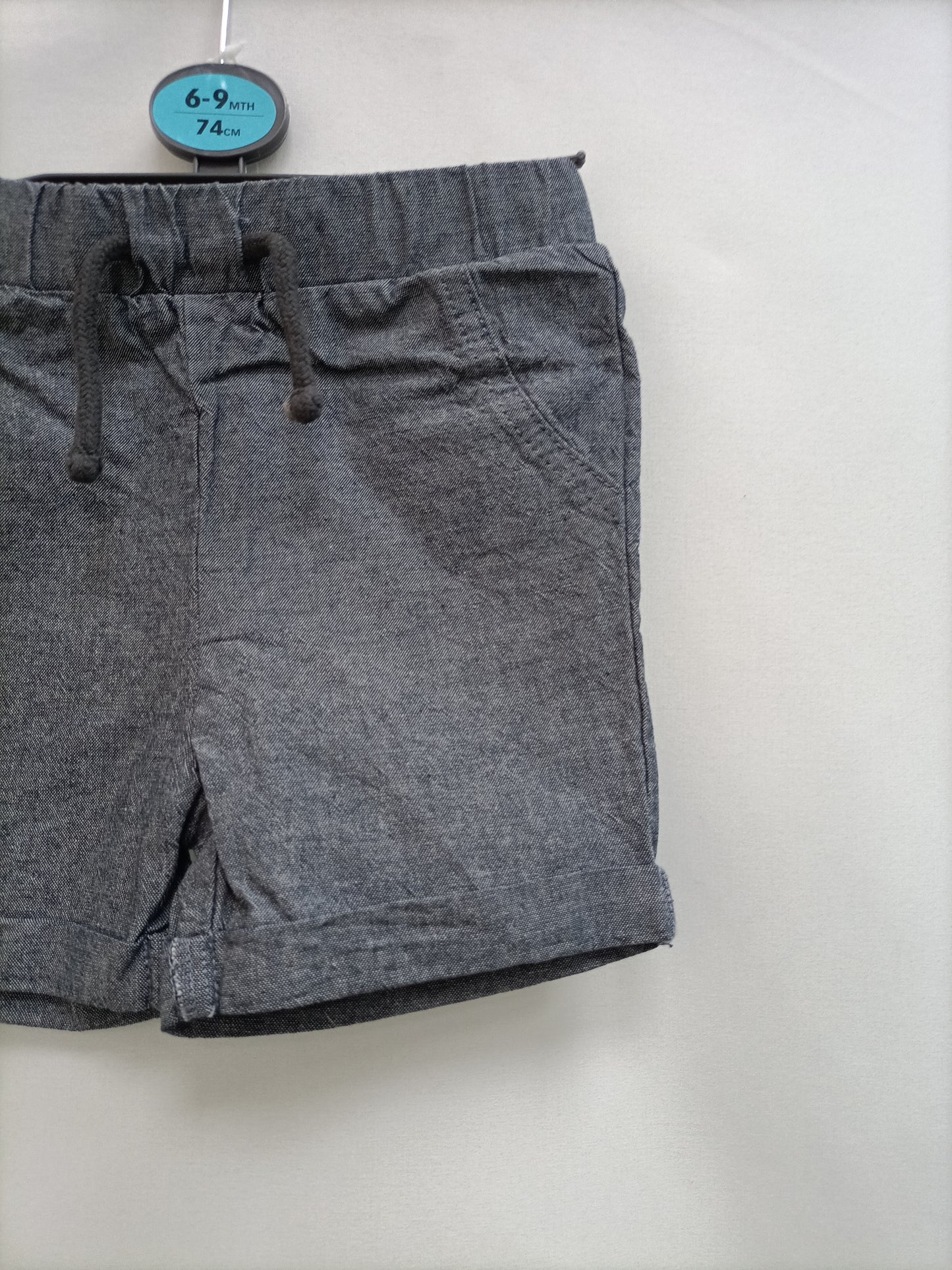 PRIMARK. Pantalón corto gris T.6-9 meses