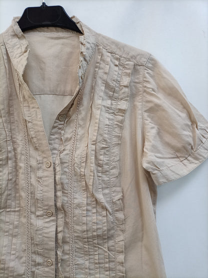 OTRAS. Blusa beige jaretas Tu(s)