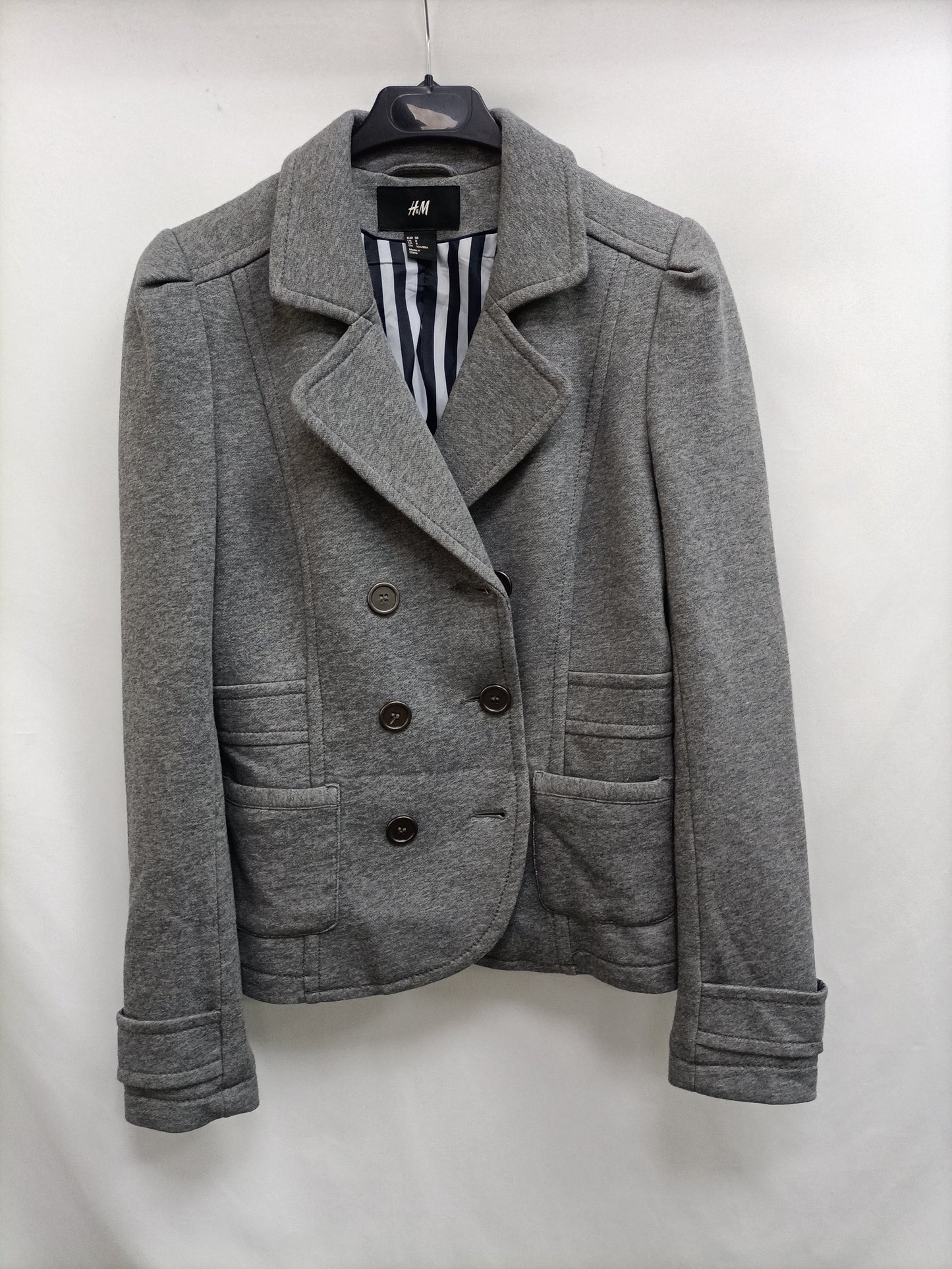H&M. blazer gris punto   T.38