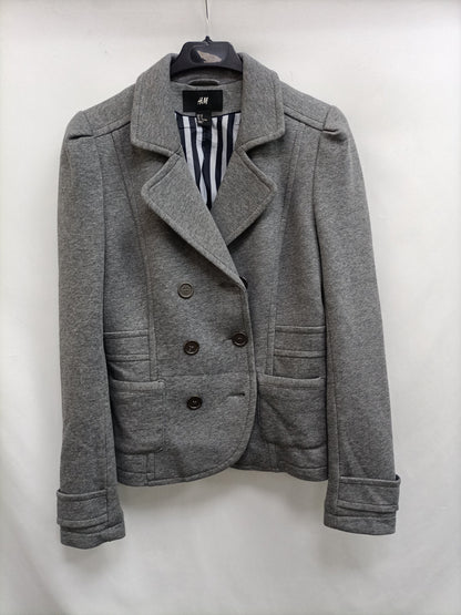 H&M. blazer gris punto   T.38