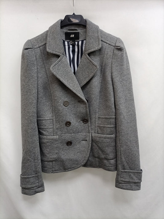 H&M. blazer gris punto   T.38
