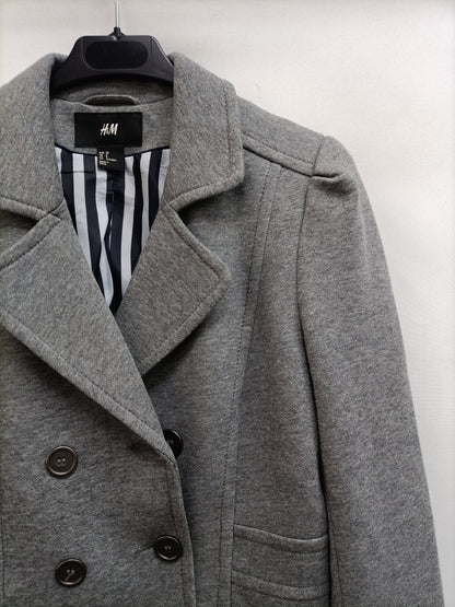 H&M. blazer gris punto   T.38