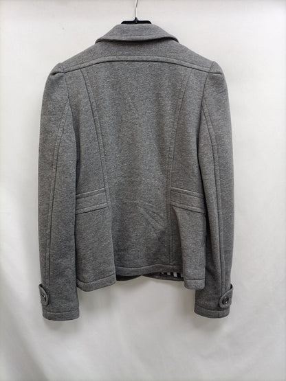 H&M. blazer gris punto   T.38