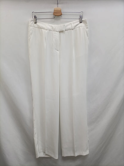 NAFNAF. Flowy white trousers size 40
