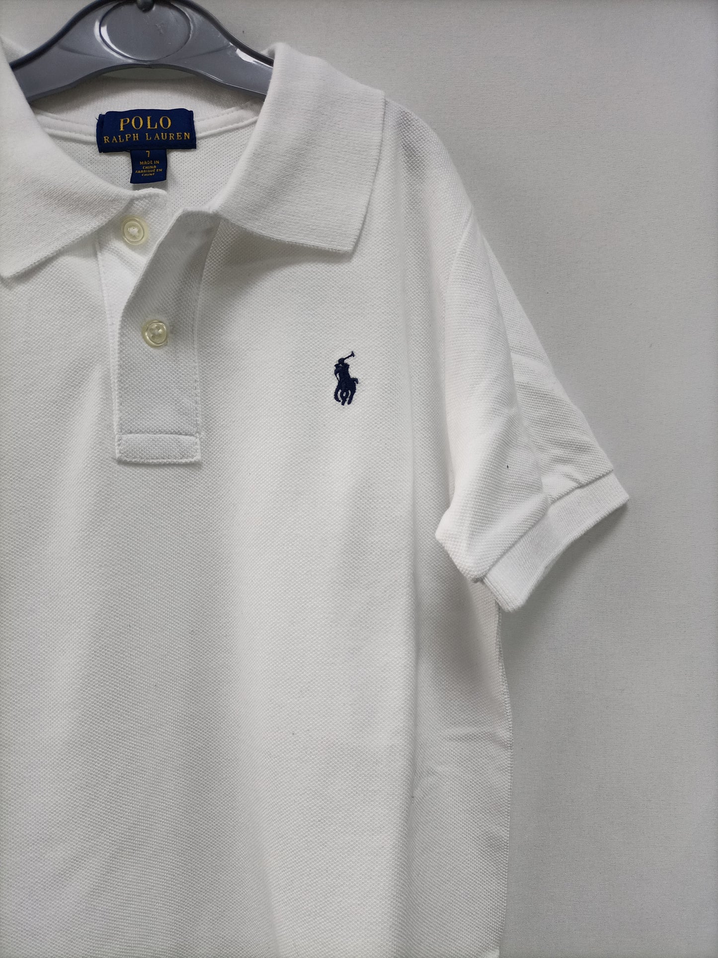 RALPH LAUREN.  Polo blanco  T.7 años