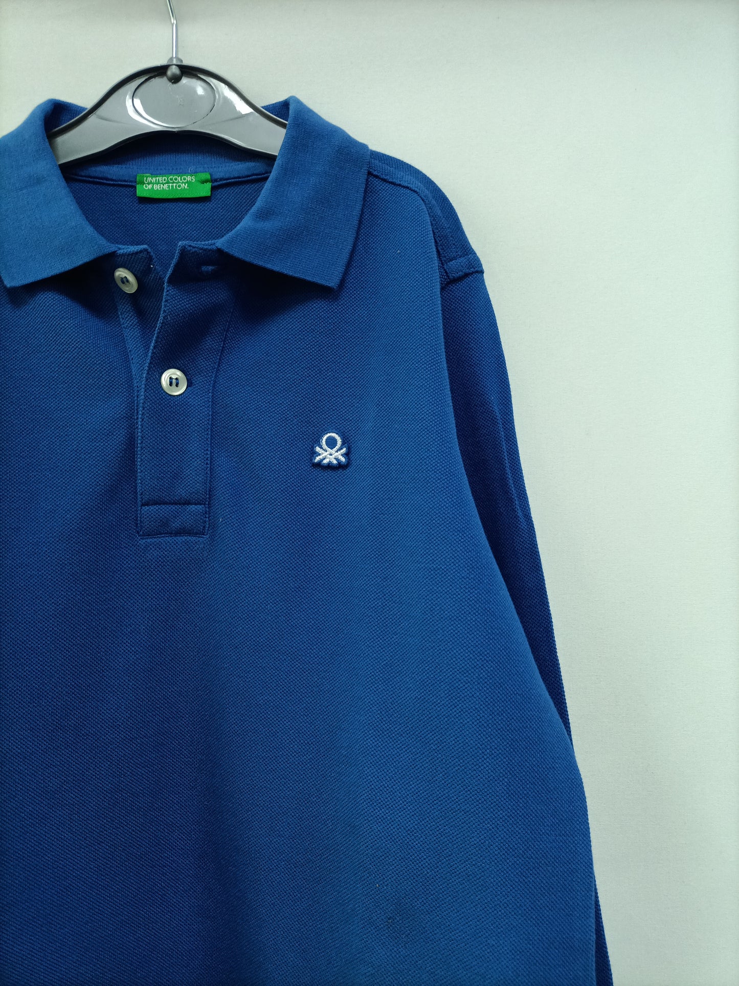 BENETTON. Polo azul T.7-8 años